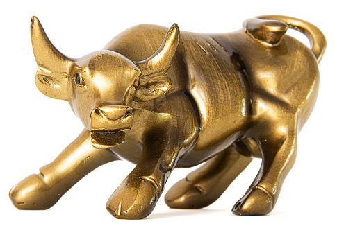 This golden bull statuette embodies the spirit of bullish trends in the professional trading arena, symbolizing wealth, economic growth, and the prosperity of long-term investments in the bustling world of the stock market.