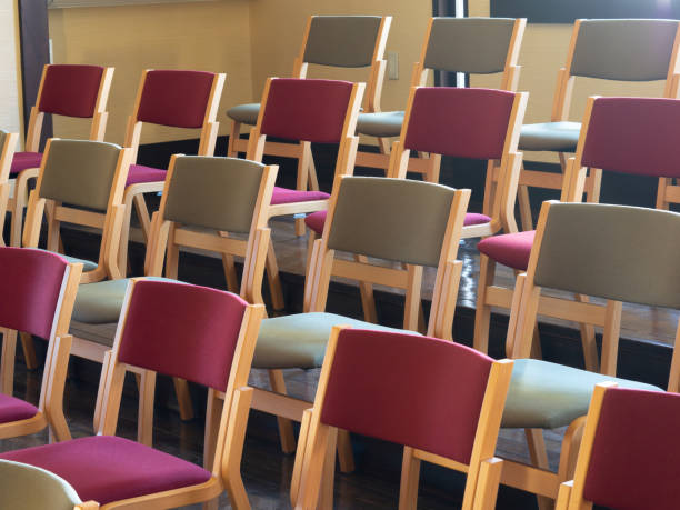 istock lots of chairs in light 2150478103