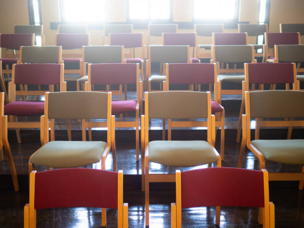 istock lots of chairs in light 2150478104