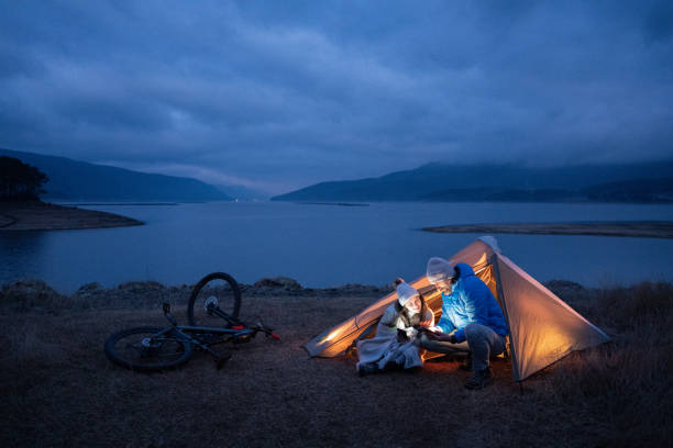istock Romantic camping night. People in nature. 2150480413