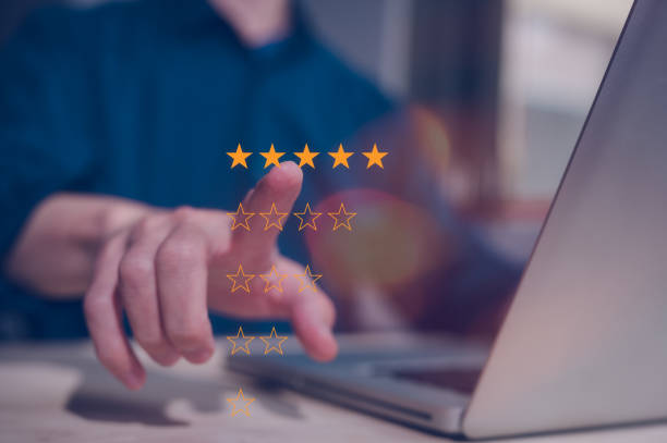 istock customer service satisfaction survey concept, Businessman working with computer and pressing on virtual five stars 2150482102
