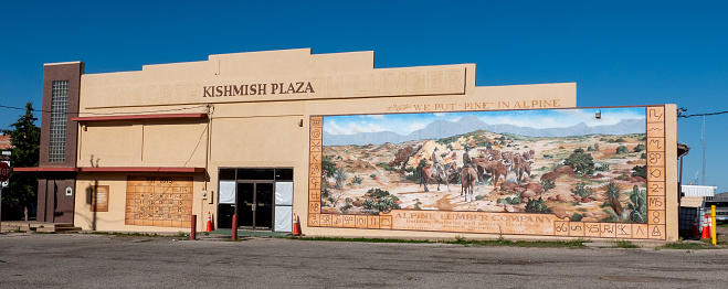 Newport Beach, CA / USA – May 15, 2019: Located on the corner of Main St and E Bay Ave, the Balboa Pavilion Mural is a look back to 1918 of the surroundings area.
