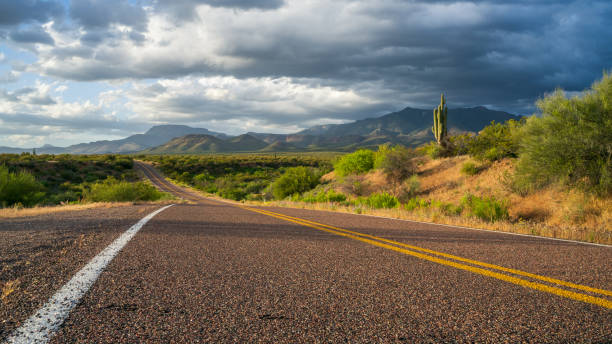 Highway 288 winds through awesome wilderness during stormy sunset