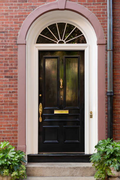 istock Black front door in New England 2150483984