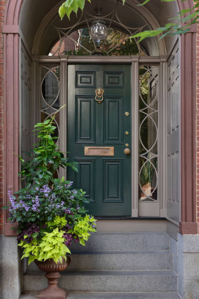 istock Green front door in New England 2150483995