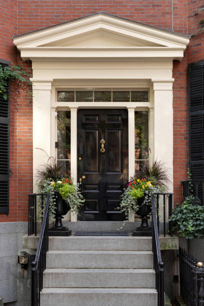 istock Black front door in New England 2150484034