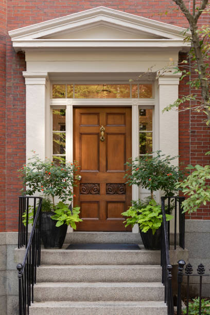 istock Brown front door in New England 2150484035