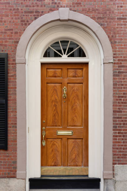 istock Brown front door in New England 2150484045