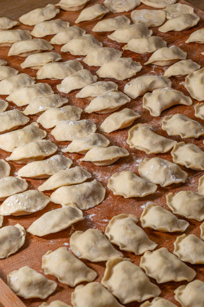 istock Beautiful rows with dumplings. Ukrainian national dish. Close-up. 2150491442