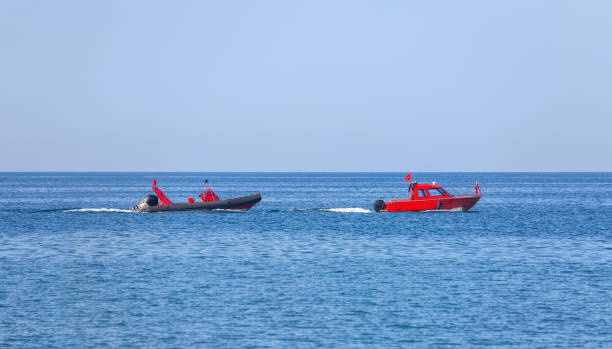 istock Rescue boat is towing a second patrol boat. 2150491682