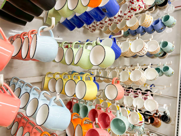 istock A row of colorful cups hanging on a rack 2150492753