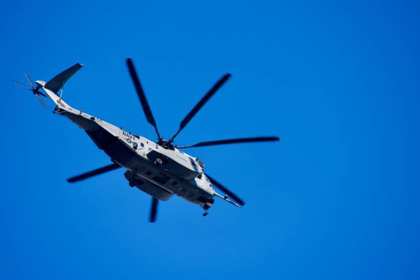 Norfolk, Virginia, USA - A U.S. Navy CH-53E Super Stallion heavy-lift helicopter flies overhead as it approaches Naval Station Norfolk Chambers Field.