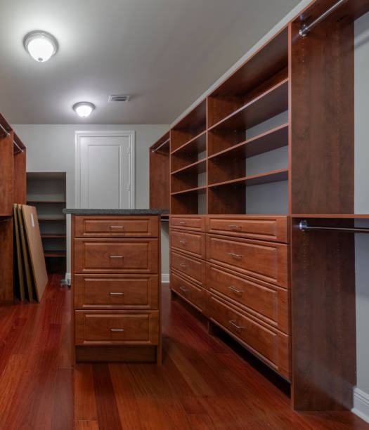 istock Walk-in closet installation in a house 2150493059