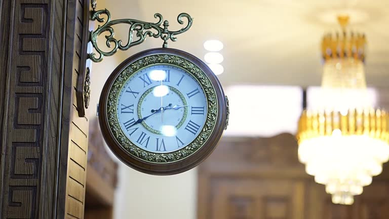 Clock hanging on the wall in House