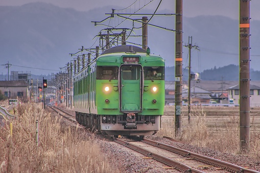 Konan Town Fukagawa, Koga City , Shiga Prefecture.\n October 11 ,2022:   West Japan Railway Company ,Kusatsu Line.\n An  train heading from Konan Station to Kibukawa station.