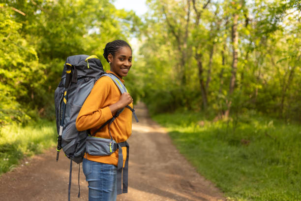 istock Young woman enjoying solo hiking 2150501120
