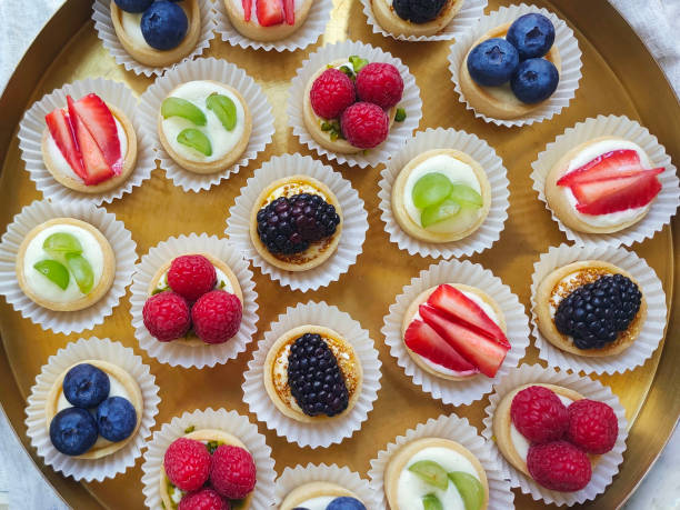 istock Tiny cupcakes with various fruits. Catering buffet for events. 2150501351