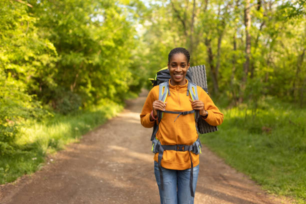 istock Young woman enjoying solo hiking 2150501509