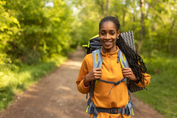 istock Young woman enjoying solo hiking 2150501580