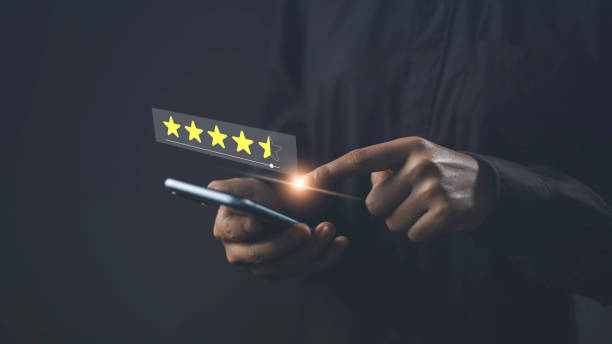 Customer use smartphone show a five star ranking best ranking. Online satisfaction surveys for customer review concept. Business service feedback rating result on smartphone.