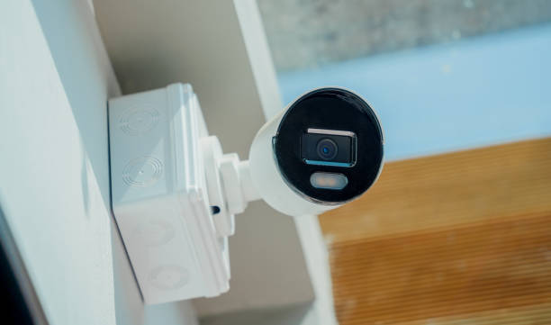 Modern CCTV camera on a wall of a residential building