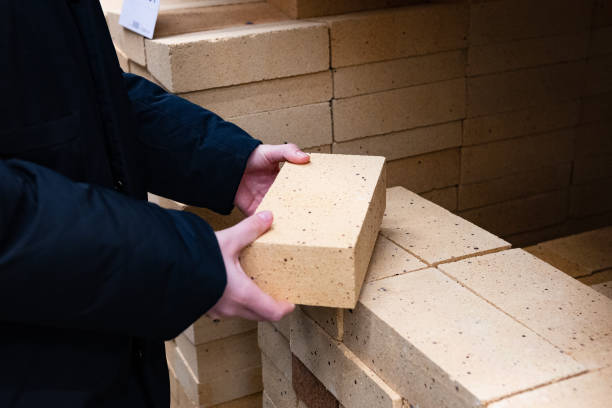 Industrial production of elastic clinker tiles. Modern technologies with the use of polymeric materials and natural clay. Facade ceramic tiles for exterior decoration of houses.