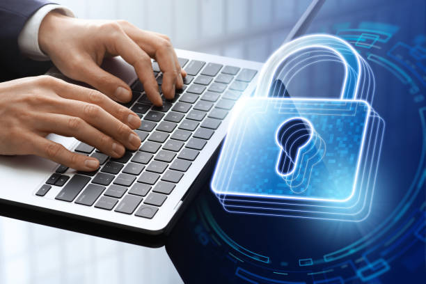 istock Information security and cyber security. Encrypted communication and secure login. Business man using laptop. Laptop and pad lock icon. 2150508486