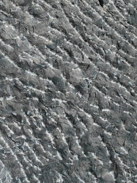 istock black stone background. Black marble abstract nature background. 2150511582