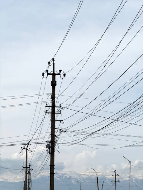istock A pole with wires stretching across the sky 2150512919