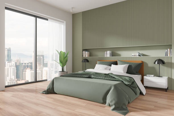 istock Stylish cozy bedroom interior with bed and decoration, panoramic window 2150513201
