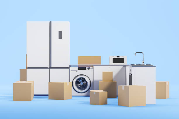 istock Home kitchen appliances and cardboard boxes on blue background, delivery 2150513386