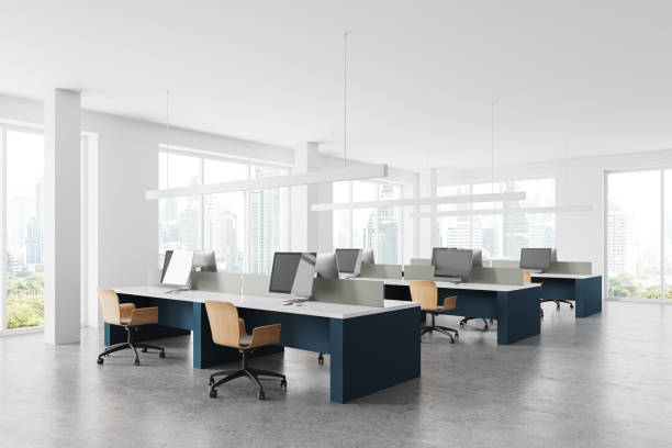istock White coworking office corner with blue tables 2150513461