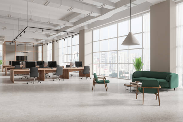 istock Office interior with pc computers on desk, coworking and chill space near window 2150513682