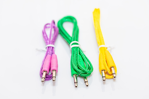 Multicolor cable isolated on white background, clipping path included. Mini Stereo Jack to Jack Plug Audio Cables
