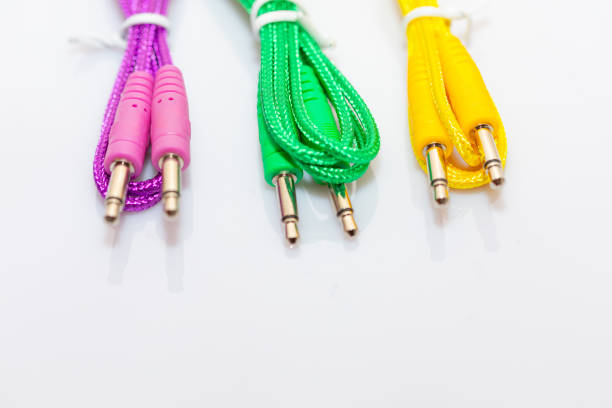 Close up fo a red audio cable against blue background