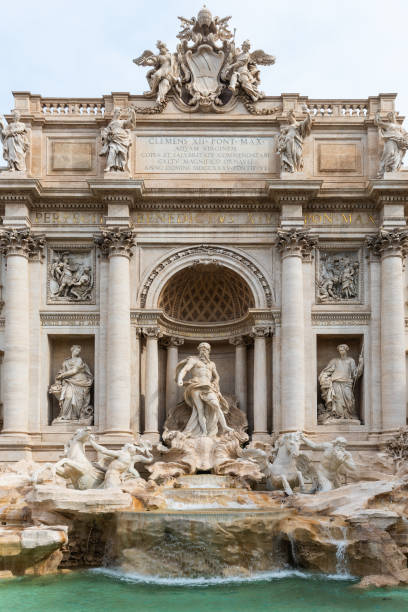 Slide photograph from 2002 capturing the Trevi Fountain (Fontana di Trevi) in Rome, Italy—one of the world’s most iconic Baroque landmarks. Water cascades dramatically into the basin below, emphasizing the fountain’s dynamic sculptural energy. The analog film texture adds nostalgic depth, making this visual ideal for editorial, travel, historical, and mythological-themed creative use. A timeless portrayal of Rome’s artistic and cultural splendor.