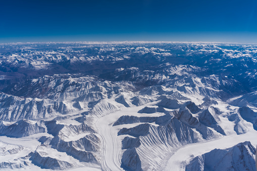 Aerial view of the Himalayas covered with white snow at Lah Province, Ladakh India.