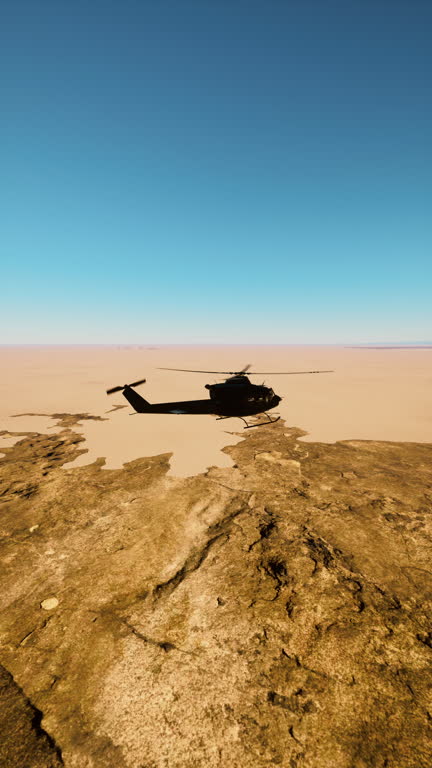 Vintage Military Helicopter Flying Over Desert