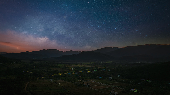 Milky way over locating on mountain view between Mountain view, Ratchaburi, Thailand.
