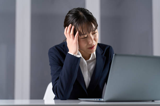 istock Business woman working overtime at night 2150521243