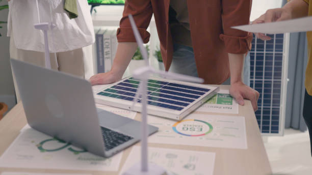 istock Eco-Conscious Business Team Evaluating Solar Energy Solutions. 2150523294