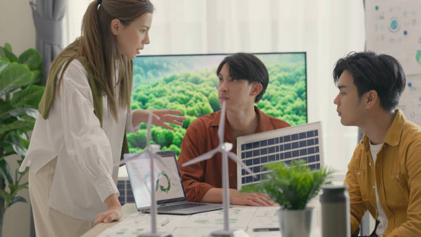 istock Team Engaged in Renewable Energy Business Strategy Discussion. 2150523321