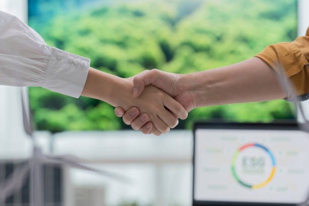 istock Close-UP Professional Handshake Over Sustainable Energy Planning. 2150523360
