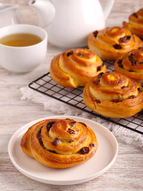 istock Custard cream and raisin buns 2150524480