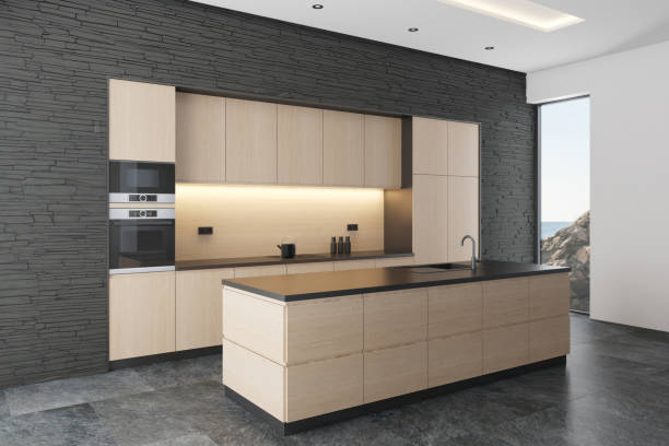 istock Black and Wood Modern minimalist kitchen with long island. Dark and light matte materials. 2150527542