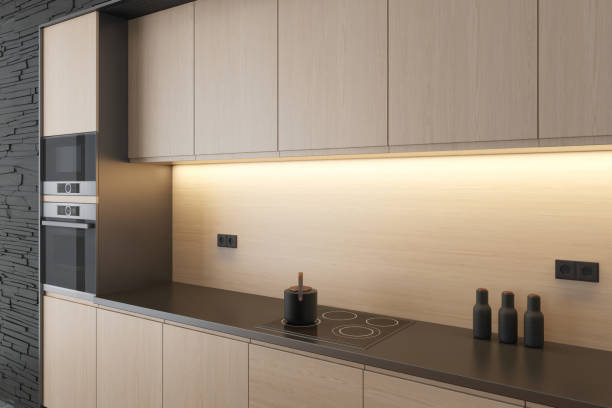 istock Black and Wood Modern minimalist kitchen with long island. Dark and light matte materials. 2150527550