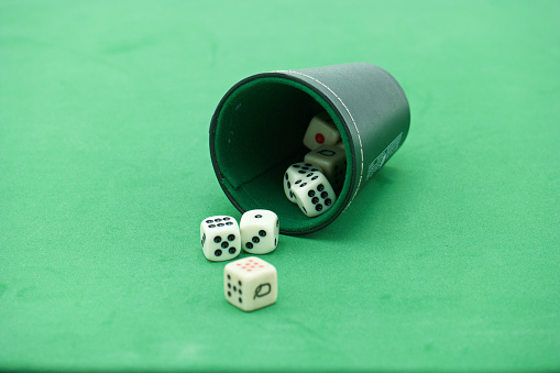 Dices with dice cup
