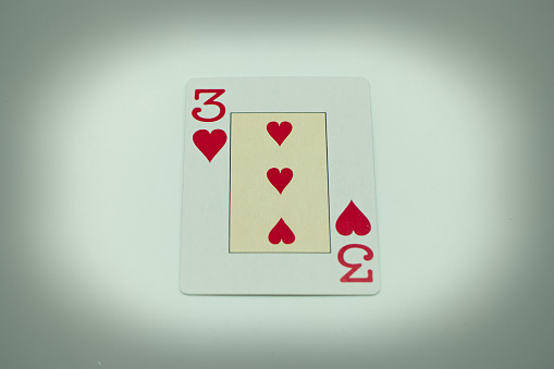 Five of Diamonds. Isolated on a gray background. Gamble. Playing cards. Cards.