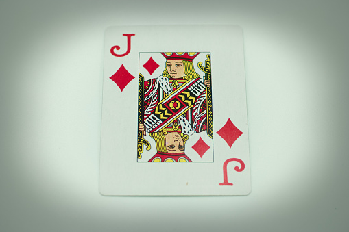 Playing cards showing new year 2024 on an isolated black background. Copy space.