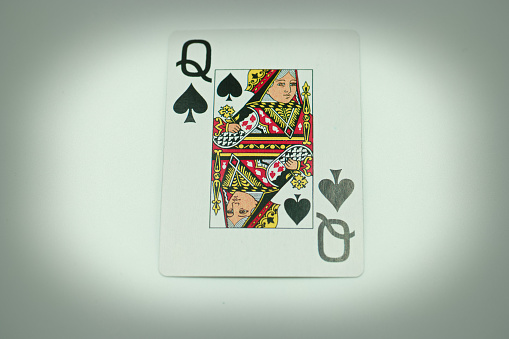 Top view of deck of cards with the ace of hearts on top